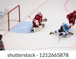 Small photo of PODOLSK - SEPTEMBER 30, 2018: J. Ortio (31) in action, V. Pervushin (50) fall down on hockey game Vityaz vs Sibir Novosibirsk on Russia KHL championship on September 30, 2018, in Podolsk, Russia