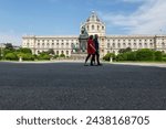 Small photo of Vienna, Austria - June 20, 2023: People in front of the monument to Empress Maria Theresa