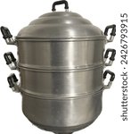 Small photo of 3 tier traditional aluminum steamer pot isolated on white background with clipping path, 3 tier boiler steamer cooking pot with lid and silicone hand