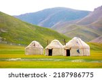 Small photo of Yurt. National old house of the peoples of Kyrgyzstan and Asian countries. national housing. Yurts on the background of green meadows and highlands. Yurt camp for tourists.