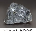 Small photo of Mineral stone - magnetite (lodestone). Magnetite is the most magnetic of all the naturally-occurring minerals on Earth.