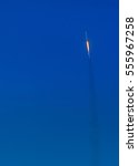 Small photo of Lompoc, California, USA - January 14, 2017: Vandenberg Air Force Base where Spacex launched this morning a Falcon 9 rocket. The rocket in the blue air fifteen seconds after take off. Fire and smoke.