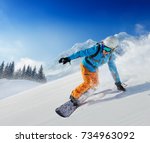 Young man snowboarder running...