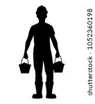 worker with bucket silhouette... | Shutterstock .eps vector #1052360198