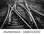 Railroad Track Switches at railway junction - monochrome image