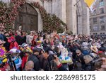 Small photo of NEW YORK, NY - APRIL 09, 2023: People wearing costumes and lavishly decorated hats attend the Easter Parade and Bonnet Festival 2023 outside St. Patrick's Cathedral on Fifth Avenue on Easter Sunday.