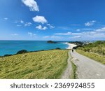 Small photo of New Zealand. Mount Maunganui. Mt Maunganui. Tauranga New Zeland. Travel in NZ. Beach of Tauranga. Happy holiday. Vacation times. Beautiful Blue sky at the beach. Hiking at Mount Maunganui. the Beach.