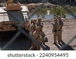 Small photo of El Paso, TX USA December 21, 2022 Texas National Guard troops deployed to El Paso, TX amid a migrant surge.