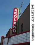 Small photo of Clinton, Oklahoma - September 7, 2020: The historic Redland Theater along old Route 66. Vertical shot.