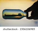 Bottle with ship on the beach at sunset image - Free stock photo ...