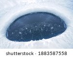 Round Ice Hole. Winter Season 