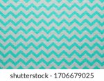 Pattern of blue and white striped zig zag. Macro textile texture