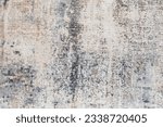 Small photo of Texture of a natural carpet with an abstract pattern, close-up. Modern carpet, carpet fabric background, design, floor carpet, interior design elements.