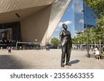 Small photo of Rotterdam, the Netherlands - 08.21.2023: statue ‘Moments Contained’ by Thomas J Price next to Rotterdam Central Station