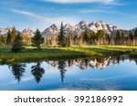 A Mountain Range with Its Reflection, Grand Teton National Park, USA.  Landscape is unique and part of Rocky Mountain. Grand Teton National Park is also popular among landscape and nature photographer