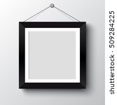 blank photo frame on the wall... | Shutterstock .eps vector #509284225