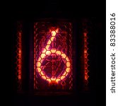 Small photo of The real Nixie tube indicator of the numbers of retro style. Indicator glow with a magical purple fringing. Digit 6