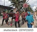 Small photo of A group of religious marchers celebrating the birthday of the Prophet Muhammad SAW in Central Java, Indonesia, 24 September 2023.