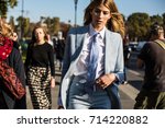 Small photo of Paris, France - October 2, 2016: Street style fashion photo. Veronika Heilbrunner wearing classic blue suit before Chanel show ready to wear spring/summer 2017(Street style by Alena Vezza)