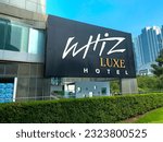 Small photo of Surabaya, Indonesia - 28 June 2023: “Whiz Luxe Hotel” huge signage. This is a 5 stars hotel located in West Surabaya.