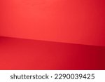 Red studio gradient background...
