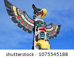 Small photo of DUNCAN BC CANADA JUNE 22 2015: Totem pole in Duncan's tourism slogan is "The City of Totems". The city has 80 totem poles around the entire town, which were erected in the late 1980s.