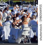 Small photo of VICTORIA BC CANADA JUNE 19 2015: “Diner en Blanc” will take place. Thousands of people, dressed all in white, and conducting themselves with the greatest decorum, elegance, and etiquette