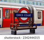 Small photo of LONDON UNITED KINGDOM 06 19 2023: Earl's Court tube station is a Grade II listed London Underground station in Earl's Court, London, on the District and Piccadilly lines.