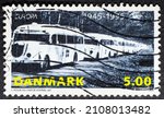 Small photo of MADRID, SPAIN - JANUARY 17, 2022. Vintage stamp printed in Denmark shows White Coaches 1945-1995. Repatriation of Danes from German concentration camps