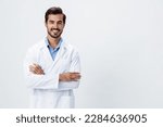 Man doctor in a white coat with a stethoscope smile with teeth and good test results looking into the camera on a white isolated background, copy space, space for text, health