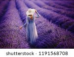 Woman In Lavender Flowers Field ...