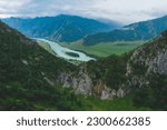 Summer landscape Altai mountains summer Russia, aerial top view. Blue Katun river with fog mood.