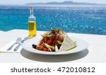Greek Salad And Olive Oil On...