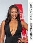 Small photo of Charmaine Pratt attends "MILE 22" Los Angeles Premiere at The Regency Village Theatre, Los Angeles, California on August 9th, 2018