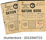 Small photo of TENTERDEN, ENGLAND - JULY 23, 2021: A pair of British food ration coupon books. Introduced in 1940 during the Second World War, rationing was ended in 1954.