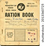 Small photo of TENTERDEN, ENGLAND - JULY 23, 2021: A British food ration coupon book. Introduced in 1940 during the Second World War, rationing was ended in 1954.