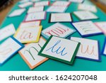 Small photo of Cardboards with syllables for learning to read