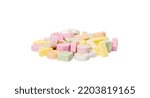 Small photo of Tablet candies isolated with clipping path. Compressed sugar powder confectionery, dextrose candy necklace parts, vitamin c tablets, lozenges on white background