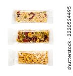 Small photo of Nut Bar in Plastic Package Isolated, Energy Snack with Nuts, Muesli, Protein Candy Bar, Fitness Fruit and Nut Mix on White Background, Clipping Path