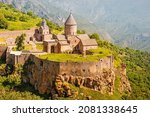 Small photo of Majestic Tatev Monastery located on an inaccessible basalt rock with wonderful views of the Vorotan River gorge. Travel and worship attractions in Armenia