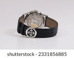 Small photo of Miami, FL, USA July 14, 2023 Patek Philippe Grand Complicated Perpetual Calendar Ref 5140P-001 showing the black leather strap and Patek clasp