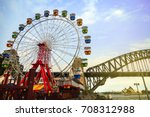 Colourful ferris wheel carriages at an amusement park Sydney Australia
