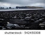 Volcanic Rock On Black Sand...