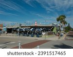 Small photo of O Maddy's Bar and Grille Tuesday Market Waterfront Shopping, coast, Editorial Use, November 21, 2023