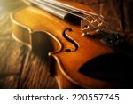 Violin In Vintage Style On Wood ...