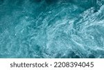 Small photo of Aerial view of the waves and rapids of the wild river, close-up, top shot