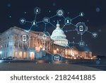 Small photo of Front view, Capitol dome building at night, Washington DC, USA. Illuminated Home of Congress and Capitol Hill. Social media hologram. Concept of networking and establishing new people connections