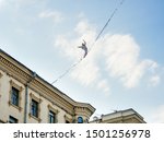 Small photo of MOSCOW, RUSSIA - September 07, 2019. Funambulist over Tverskaya street. Street festival and different leisure activities on Moscow Day celebration.