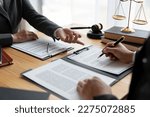 Small photo of Lawyers, lawyers, Asian businessmen are working together to clarify. Review and review business contracts or life insurance contracts for benefits or sign documents and get a loan start a business.