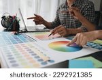 Small photo of Engineers, graphics, architects and painters are meeting to discuss and record details about paint textures. The color tone on the color sheet to match the appropriate structure plan.